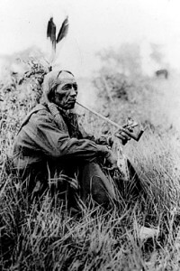 Native American Smoking A Pipe