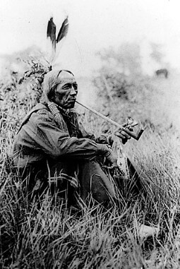 Native American Smoking A Pipe