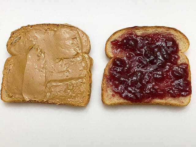 Two slices of Sara Lee white whole grain bread, one covered with Welch's concord grape jelly and the other covered with Jif peanut butter, in the Franklin Farm section of Oak Hill, Fairfax County, Virginia